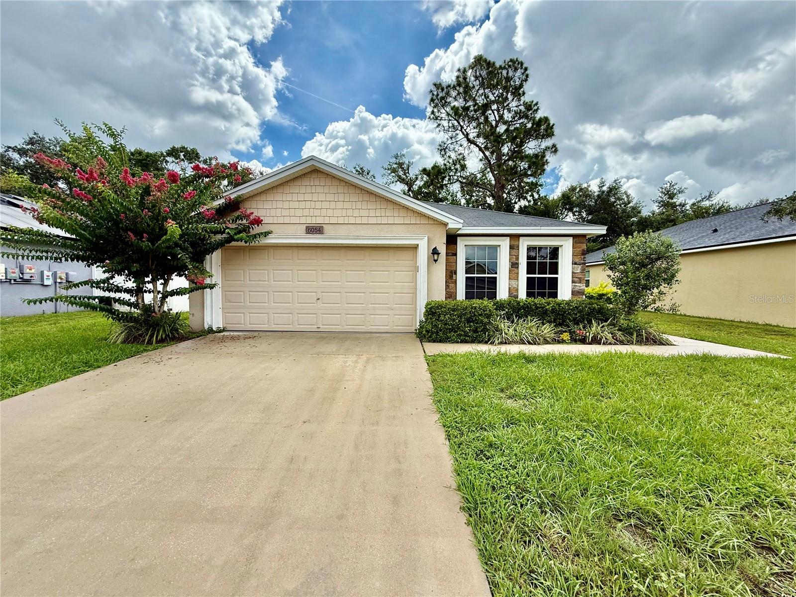 Welcome to this charming 3-bedroom, 2-bath home, ideally situated in a highly desirable neighborhood. As you step inside, you'll immediately appreciate the spacious, open layout that seamlessly connects the living areas, perfect for both entertaining and daily living. The home boasts unique finishes that add a touch of character and style throughout. The master suite features a luxurious en-suite bathroom with a double vanity and a generously sized bathtub, providing a serene space to unwind. With ample closet space in every room, you'll never be short on storage. Outside, you'll find a relaxing screened-in lanai, ideal for enjoying the outdoors in comfort, away from the elements. The attached 2-car garage offers both convenience and additional storage options. This home combines both functionality and charm, making it a perfect fit for any family! In addition to the advertised base rent, all residents are enrolled in the Resident Benefits Package (RBP) for $50.00/month which includes HVAC air filter delivery, credit building to help boost your credit score with timely rent payments, utility concierge service making utility connection a breeze during your move-in, and much more! More details upon application. Pets welcome! Max two pets, no breed or weight restrictions. Vacant and available now!