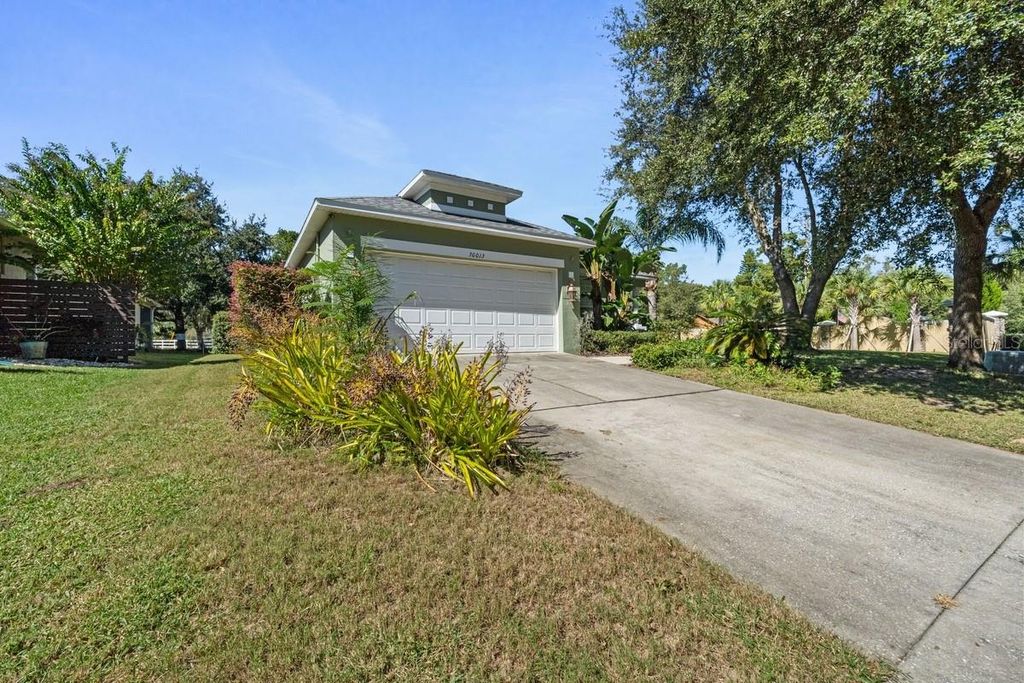 Photo of 30013 Pga Drive, Sorrento, FL 32776 (MLS # TB8444236)