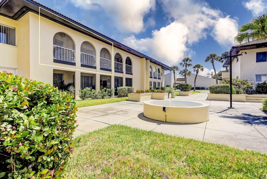 A perfectly appointed fully furnished two-bedroom, one bath condo in the quaint and vibrant complex of Village Plaza, this 55 and over community is centrally located to the best that Sarasota has to offer. Perfect for year-round enjoyment or as your winter getaway, this 2nd floor PET FRIENDLY end unit comes equipped with all you’ll need for an “instant vacation”- Fully stocked and functional kitchen with a separate dining area off the kitchen, the cozy living room offers floor-to-ceiling sliders that lead to your private screened-in patio overlooking the tranquil courtyard. The spacious main bedroom has a large walk-in closet, and the guest bedroom has direct access to the patio from the sliding glass doors. Ample closet space and a bonus storage closet on the patio for all your beach gear. BRAND NEW WATER HEATER. Within the inviting enclave of Village Plaza you will find 62 apartment-style units (in addition to the 88 villas) offering a variety of amenities including a heated swimming pool, sauna, community BBQ grilling area, clubhouse, fitness center, library, billiards room, pickleball & shuffleboard, a community herb garden and a gathering center that hosts a variety of social events including yoga, water exercise classes, trivia, a bridge club and a book club, happy hour and more. The clubhouse, pool, and pickleball court are just one building over, mere steps from the unit. Just 6 miles to famed Siesta Key Beach, 5 miles to the vibrant cultural offerings of downtown Sarasota, and a mile to the Legacy Trail and a top-rated golf course. Village Plaza is walking distance to Starbucks, Publix, Walgreens, Home Goods and more. Convenient to shopping, dining & banking, with public transportation right outside the complex. Under 3.5 miles to the I-75 and the 2 best hospitals in our area. Super low monthly HOA of $462 includes Cable TV, Internet, Common Area Taxes, Community Pool, Escrow Reserves Fund, Maintenance Grounds, Maintenance Repairs, Pest Control, Pool Maintenance, Private Road, Maintenance Exterior, Manager, Pest Control, and Recreational Facilities. Meet new friends and enjoy the maintenance-free lifestyle Village Plaza has to offer!