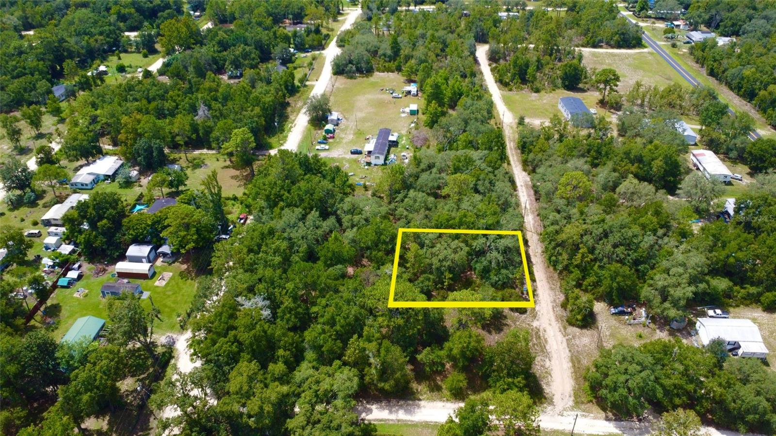 Great land opportunity for modular home or perfect place to build your dream home with country living and land privacy, great price and right off U.S. highway 27. Enough room for trailer, boat, 4-wheelers and more. 105'X108' (WXL) lot on side of a hill on a private street, free from flood zone & and no wetland, HOA & CDD free. Lot measurer 0.26 acre (+/- ) & addition 4 adjacent lots for sale separately. Minutes to Bronson and Downtown Williston 10 minute drive to town; grocery, shops and restaurants, in-between US-HWY 27 and NE 60th street.
Great local actives to visit: Horse Riding at Canopy Oak Trails or Williston Horseman's Park, Adventure into Cedar Lakes Woods and Gardens, or Dive into Devil's Den Pre-Historic Spring and Diving Training
GPS Coordinates: 29.417303, -82.542718
Contact the Levy County land development/zoning and planning to discuss building specifications and confirm and use.