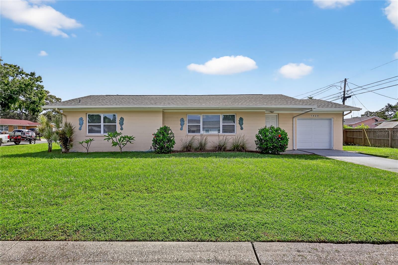 Charming 3-Bedroom Gulfport Retreat
Discover this beautifully updated 3-bedroom, 2-bathroom block home in the heart of vibrant Gulfport, FL! Nestled on a spacious corner lot, this move-in-ready gem boasts a freshly replaced roof and modern upgrades throughout, making it perfect for families, investors, or those seeking a vacation rental. Just minutes from Gulfport’s lively downtown, enjoy a short bike ride to the scenic Shore Blvd waterfront or explore the nearby Pinellas Trail for walking, biking, or skating. St. Pete Beach is only a 9-minute drive west, downtown St. Petersburg is 10 minutes east, and the Clam Bayou trail connects you south to the Maximo Marina District.
Step inside to a welcoming open-concept living, dining, and kitchen area, ideal for entertaining. The newly renovated kitchen features sleek shaker-style cabinets with soft-close drawers, elegant granite countertops, and modern stainless steel appliances—a chef’s delight! The split floor plan offers privacy, with a spacious master suite showcasing a stylish en-suite bathroom with glass-tiled shower, dual closets with organizers, and contemporary finishes. Two additional bedrooms share a beautifully updated second bathroom with a walk-in shower, new vanitie, toilet, and chic tilework.
This home shines with fresh interior and exterior paint, new interior doors, updated ceiling fans, and energy-efficient windows. Practical upgrades include a newer water heater, new gutters, an electric garage door opener, and washer/dryer hookups. The expansive lot offers room to complete a fenced-in yard—perfect for pets or adding a pool—or space along the side for a boat, RV, or trailer, a rare find in Gulfport!
Located outside the flood zone, this property is close to Stetson University, making it an excellent rental investment or a cozy forever home. With its modern amenities, prime location, and laid-back Gulfport charm, this York Street treasure is ready to welcome you. Schedule a showing today and embrace the relaxed coastal lifestyle!