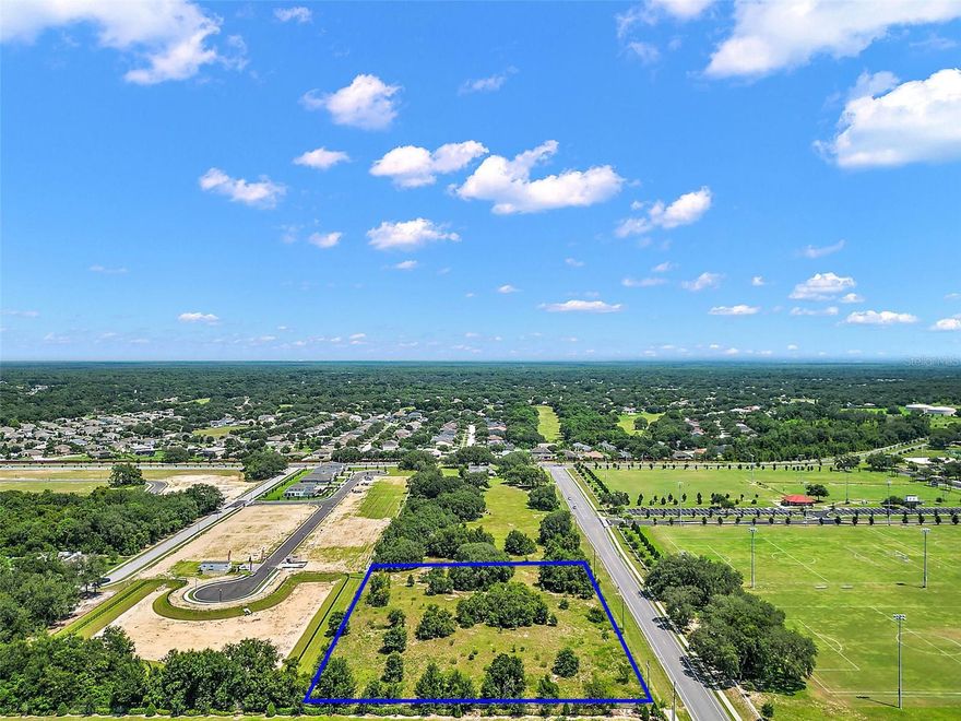 Price Improvement!  "Potential charter school site with special exemption from the City of Apopka" The City will allow Custom Luxury Residences and or up to 2 units per acre. The property is directly across the street from the City of Apopka's Northwest Recreation Complex appropriately named "Field of Fame." Excellent growth area. The property features include 401' of frontage on Appy Ln, city utilities water and sewer available. The property's location makes for easy access to major thoroughfares SR 429, Sr 46, SR 414 and Interstate 4.