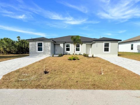 Photo of 12223 Kirk Avenue, Port Charlotte, FL 33981 (MLS # TB8429145)