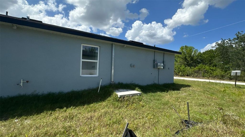 Photo of 12223 Kirk Avenue, Port Charlotte, FL 33981 (MLS # TB8429145)