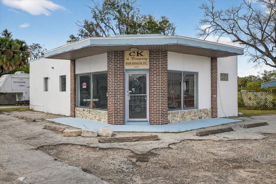 We are proud to present 1201 N. Pinellas Avenue, a versatile freestanding office building located just minutes from Downtown Tarpon Springs and the world-famous Sponge Docks. This well-positioned asset offers a unique opportunity for an owner-user or small business seeking a visible and easily accessible location along Alt 19 (N. Pinellas Avenue) — one of Tarpon Springs’ most active commercial corridors. Constructed in 1961, the property features a 1,001 SF single-story concrete block and stucco building situated on a ±0.15-acre corner lot with excellent visibility and exposure. Currently configured as a salon, the flexible layout can be readily adapted for professional office, studio, or boutique use. The site benefits from RO (Residential Office) zoning, allowing a variety of business and professional uses while maintaining neighborhood compatibility. With 18,200 vehicles/day (AADT) along Alt 19 and a convenient location near Tarpon Avenue, this property offers strong frontage and ease of access to local amenities, shops, and restaurants. The site includes eight on-site parking spaces with room to accommodate additional vehicles along the side and rear, making it ideal for small businesses requiring customer parking or service access. This property presents a rare opportunity to acquire an affordable, well-located commercial asset in one of North Pinellas County’s most charming and walkable coastal communities. Whether utilized as a salon, professional office, or creative workspace, 1201 N. Pinellas Avenue combines functionality, location, and visibility — all within minutes of Tarpon Springs’ historic downtown district.