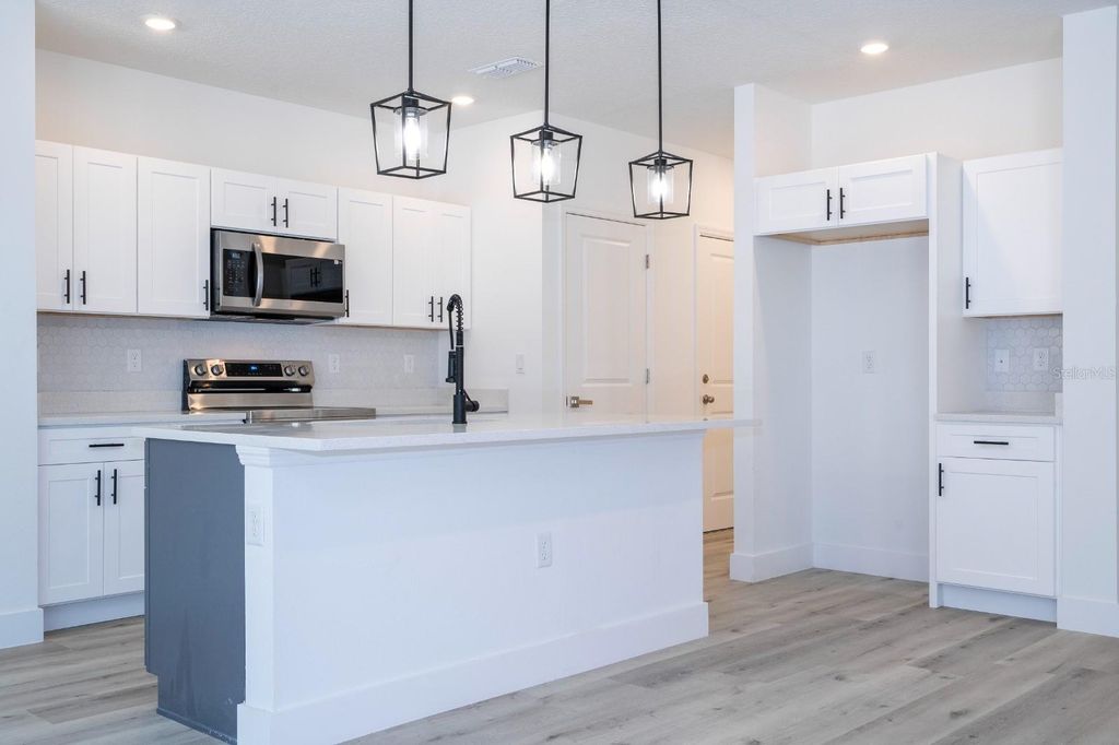 Photo of 2434 Amnesty Drive, North Port, FL 34288 (MLS # O6406005)