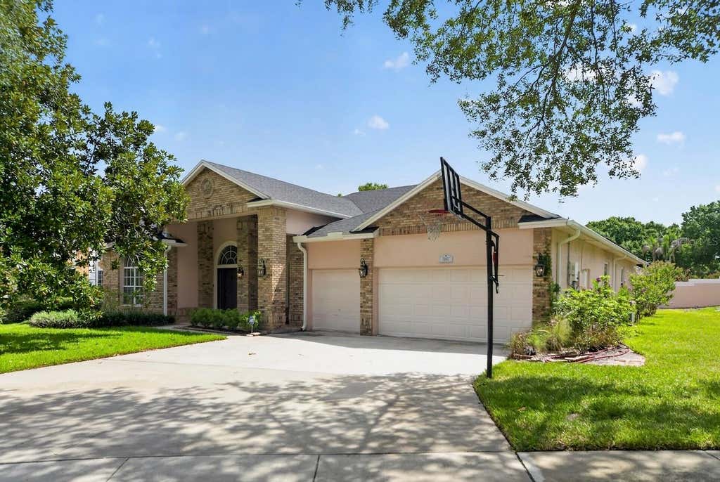 Photo of 7691 Belvoir Drive, Orlando, FL 32835 (MLS # O6435100)