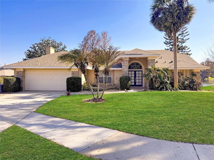 Experience the best of Central Florida living in this **stunning waterfront pool home**, where serene views and thoughtful upgrades create the perfect private retreat. From the moment you enter through elegant double French doors, you’re welcomed by breathtaking sightlines that extend from the formal living room across the screened lanai and sparkling pool to a tranquil, spring-fed pond—ideal for birdwatching, fishing, and everyday relaxation.

This spacious 4-bedroom, 3-bath residence offers a versatile and well-designed layout with both formal and casual living areas. The family room features soaring vaulted ceilings and a cozy wood-burning fireplace, creating a warm and inviting atmosphere for gatherings. The beautifully renovated kitchen (2026) showcases brand-new appliances, Uba Tuba granite countertops, ample cabinetry, and an open design that seamlessly connects to the living spaces while overlooking the pool and water views.

Throughout the home, you’ll appreciate the value of **major upgrades that provide true peace of mind**, including a brand-new A/C (Sept 2025) for energy efficiency, a full home repipe completed in 2019, a newer water heater (Aug 2020), and fully remodeled bathrooms (2025) with modern finishes—along with the completely upgraded kitchen featuring all new appliances (2026), offering both style and functionality.

The primary suite is a true sanctuary, offering direct access to the pool, peaceful waterfront views, a large walk-in closet, and a spa-inspired bathroom with dual vanities, a garden tub, and a separate shower. The fourth bedroom is perfectly suited as a home office or guest suite, enhanced by calming fountain views.

Step outside to your private, screened lanai—pre-wired for cable and designed for year-round enjoyment, whether hosting guests or unwinding in your own tropical setting. Additional features include an interior laundry room with washer, dryer, and utility sink, plus a convenient pool-access guest bathroom.

Combining **breathtaking water views, modern upgrades, and exceptional indoor-outdoor living**, this move-in ready home is a rare opportunity to own a true Florida paradise. Don’t miss it!