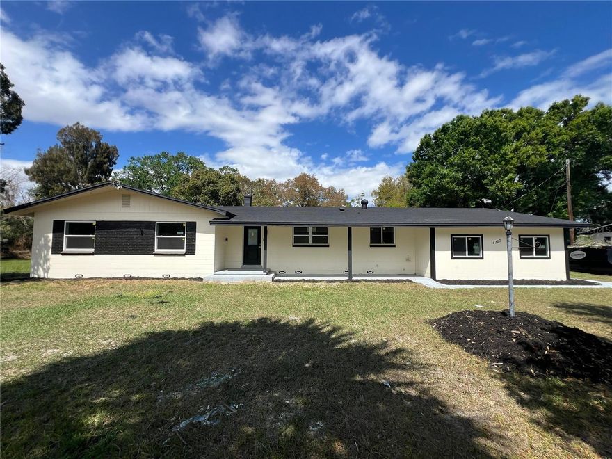 One or more photo(s) has been virtually staged. ALMOST HALF ACRE IN THE HEART OF ORLANDO 

Move-in ready Orlando gem in the heart of the city! Minutes from Downtown, shopping, dining, and major highways – this home combines style, comfort, and convenience.

Step inside to a spacious open floor plan with modern upgrades throughout. Featuring new windows, new insulation, fresh interior and exterior paint, and durable vinyl flooring, this home is as stylish as it is efficient – no popcorn ceilings!

The kitchen boasts custom cabinetry and stainless steel appliances, seamlessly integrated into the living space – perfect for entertaining or everyday living.

Stay comfortable year-round with two separate AC new units (2026/2023) for independent climate control, plus a roof replaced in 2022 for peace of mind.

Additional highlights include a dedicated home office, a huge laundry room, and elegant high-end wallpaper accents throughout.

Enjoy the oversized lot with low-maintenance landscaping, giving you plenty of space without the hassle.

Additional good size SHED!!!

Move in immediately and start living in one of Orlando’s prime central locations!