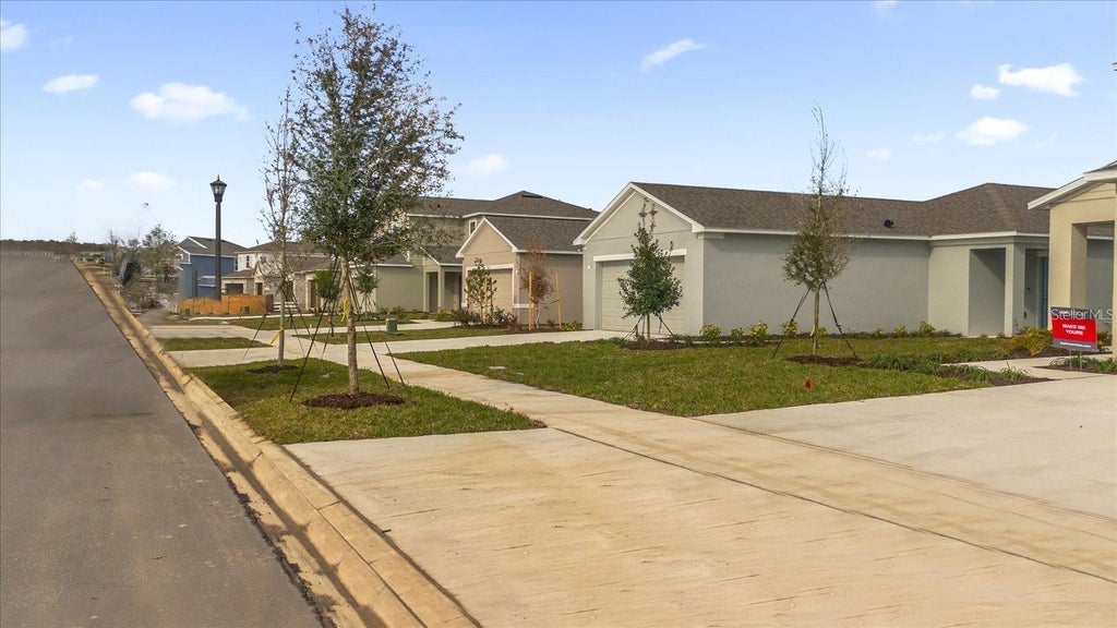 Photo of 5647 Nispero Way, Kissimmee, FL 34758 (MLS # O6450242)