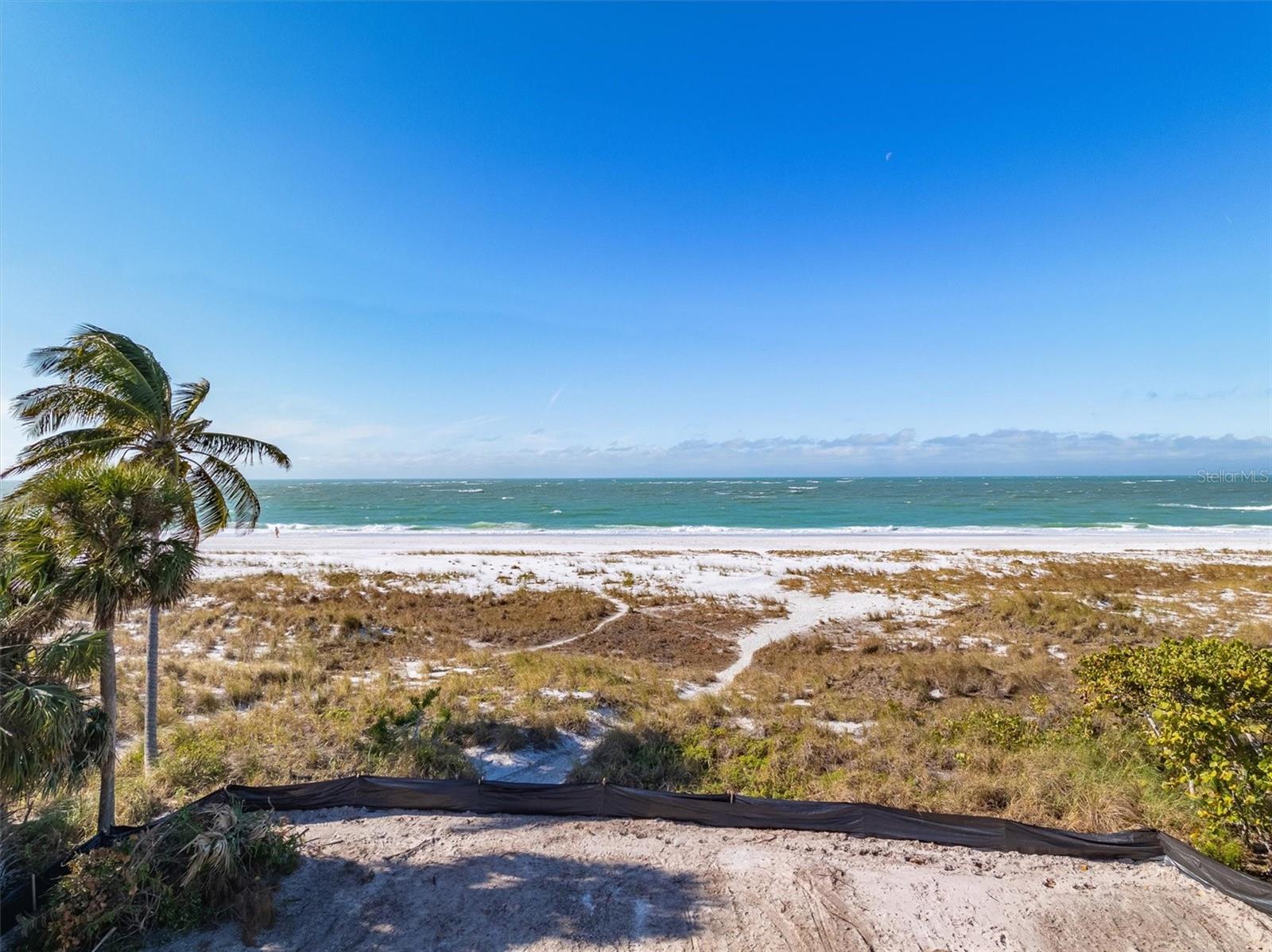 Under contract-accepting backup offers. Stunning Gulf-front property at 739 N Shore Dr, Anna Maria, FL. This cleared half-acre lot boasts 89 feet of beach frontage, offering direct access to the pristine white sand beaches of the Gulf of Mexico. Full 180-degree views of the beach and Gulf of Mexico. Year-round sunset views. Enjoy the convenience of walking to the charming restaurants and boutique shops of Anna Maria from your dream coastal haven.