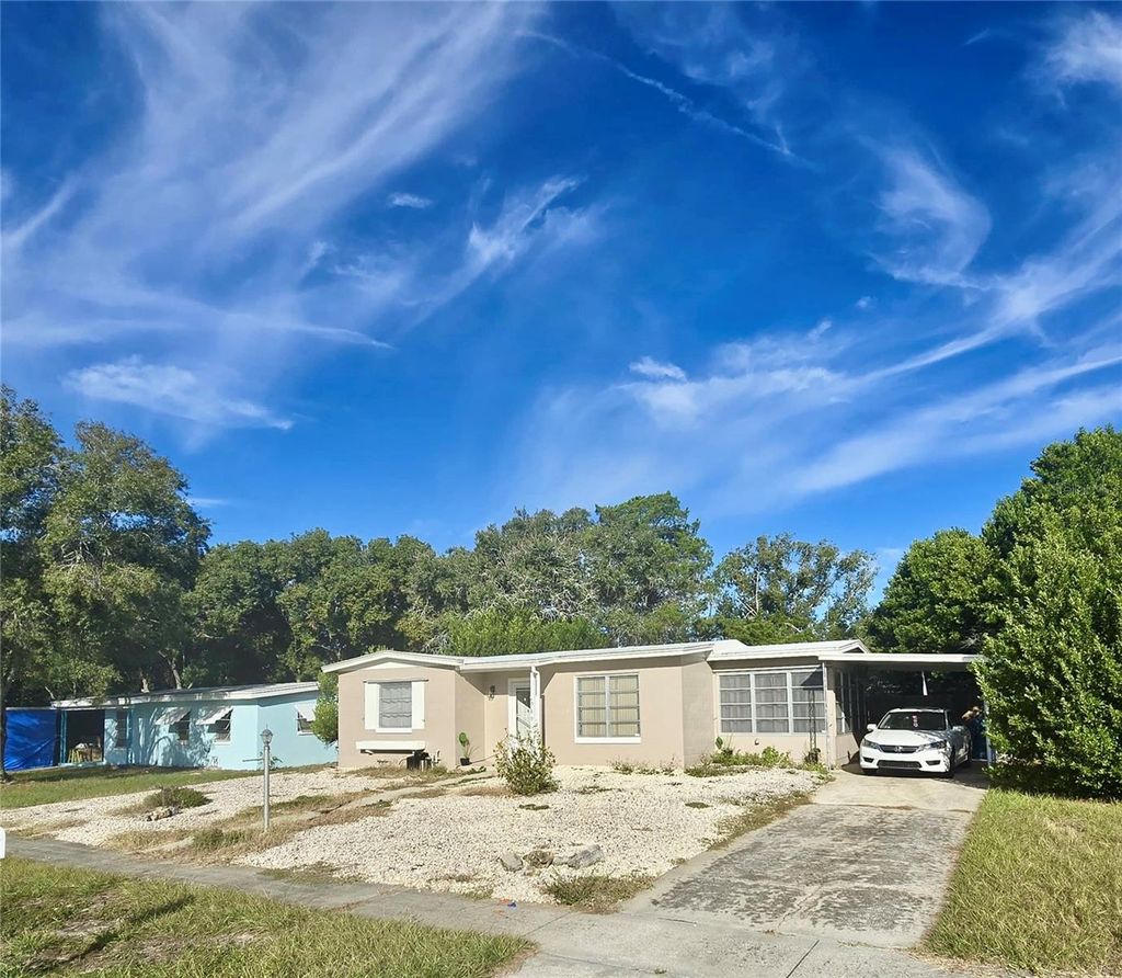 Photo of 589 Swallow Lane, Spring Hill, FL 34606 (MLS # O6350229)