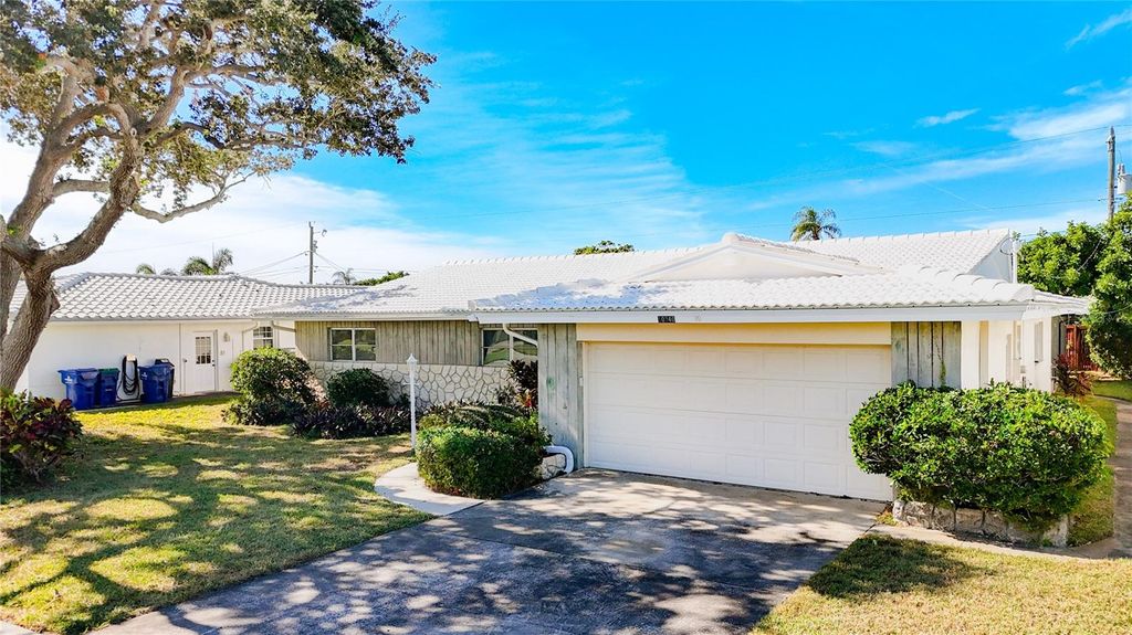 Photo of 10340 Monarch Drive, Largo, FL 33774 (MLS # TB8446829)