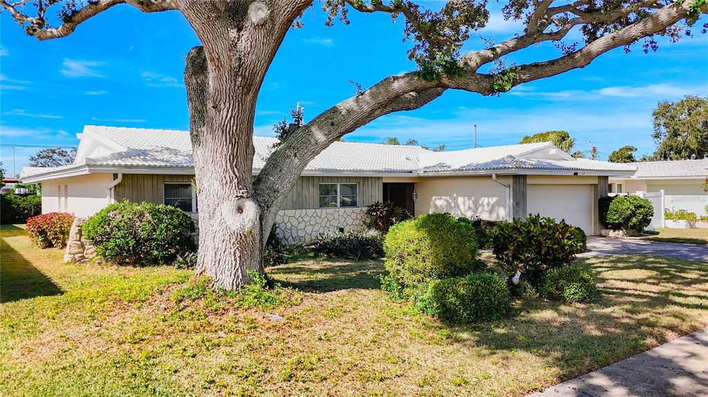 Photo of 10340 Monarch Drive, Largo, FL 33774 (MLS # TB8446829)