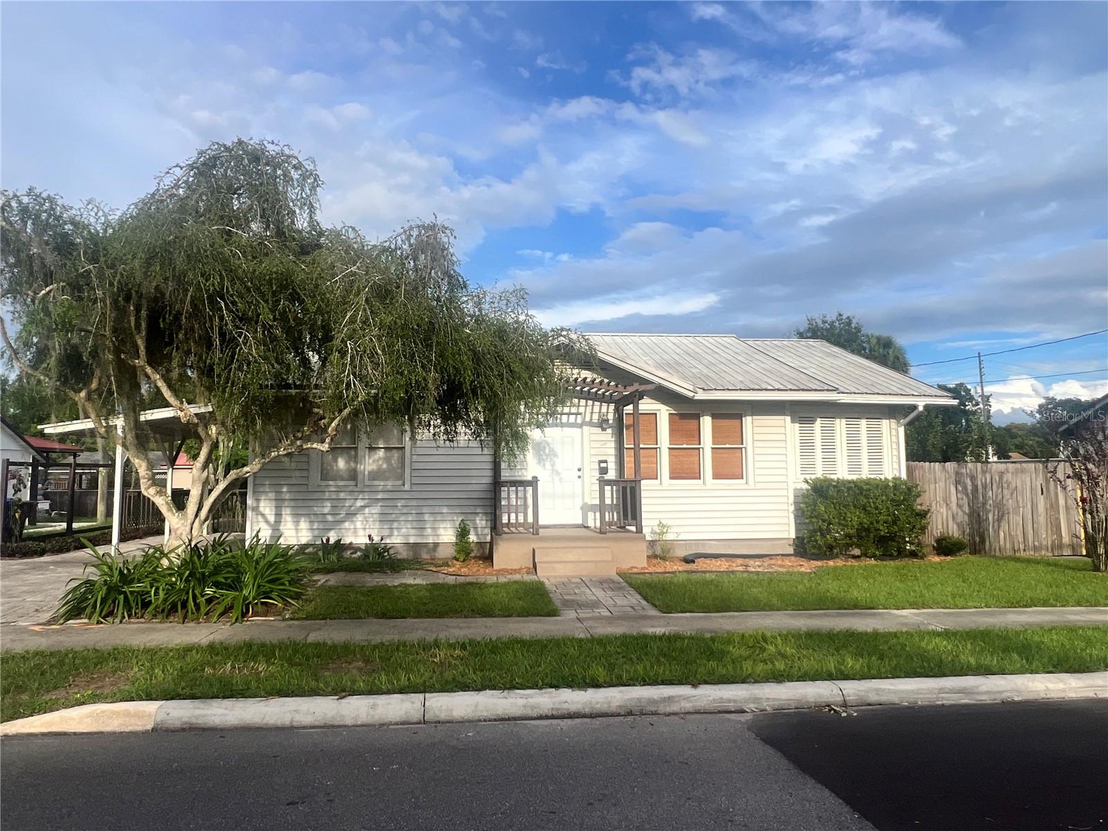 Step into timeless charm with this 2-bedroom, 1-bath treasure in the heart of Downtown Kissimmee. Centrally located and offering no HOA, no CDD, this home is the perfect blend of character and convenience.
Inside, you’ll fall in love with the solid hardwood floors that flow throughout—adding warmth, elegance, and durability that never goes out of style. Each room feels open and inviting, from the spacious living areas to the freshly painted walls that give the home a modern touch. The remodeled bathroom sparkles with updates, while the kitchen offers plenty of room for cooking and entertaining. Plus, a spacious laundry room and all appliances included make moving in a breeze!
This home doesn’t just shine on the inside. Outside, enjoy a steel roof built to last, a new A/C system, modern hot water tank, and gutters already in place. The backyard is an entertainer’s dream with pavers throughout, perfect for BBQs, family gatherings, or relaxing evenings. A carport adds convenience and extra space for your vehicles.
And then, there’s the location. Living in Downtown Kissimmee means easy access to Lake Toho’s scenic waterfront, vibrant restaurants, boutique shopping, community events, and the SunRail for effortless commuting. With the city’s exciting growth, owning a home here is more than just a smart move—it’s an investment in the future.
Best of all, this gem is priced to sell. Solid hardwood floors, spacious charm, and a prime location all come together in one incredible opportunity.
?? Don’t wait—call today and claim your piece of Kissimmee’s history and future!