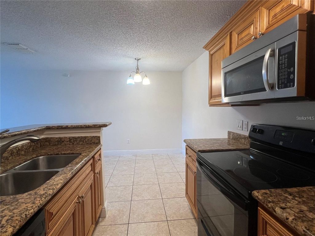 Photo of 2504 Grassy Point Drive #202, Lake Mary, FL 32746 (MLS # O6367542)