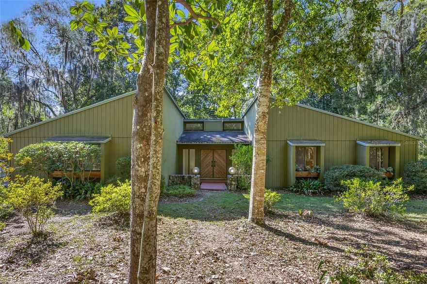 One or more photo(s) has been virtually staged. Welcome to Rock Creek, a highly sought-after community in beautiful NW Gainesville! This charming 3-bedroom, 2-bath home is perfectly tucked away on a quiet cul-de-sac in one of the area’s most established and beloved neighborhoods. Step inside to find new luxury vinyl plank flooring throughout—no carpet anywhere—and a freshly painted interior that gives the home a bright, move-in-ready feel. The split floor plan offers both privacy and functionality, featuring a cozy wood-burning fireplace and spacious living areas ideal for relaxing or entertaining. Enjoy the natural beauty of the .39-acre lot, designed for easy maintenance while offering plenty of room to unwind or play. The home also provides peace of mind with a newer HVAC (2023). Just a short stroll away, you’ll love the incredible Rock Creek community amenities, which include a keyless-entry pool, tennis and pickleball courts, basketball and racquetball courts, and a playground—all included in the low HOA fee. Located in a prime NW Gainesville location, with easy access to HCA, the University of Florida, UF Health, Santa Fe College, as well as nearby schools, parks, shopping, and a variety of restaurants. Don’t miss your chance to enjoy the perfect blend of comfort, convenience, and community living that Rock Creek is known for!