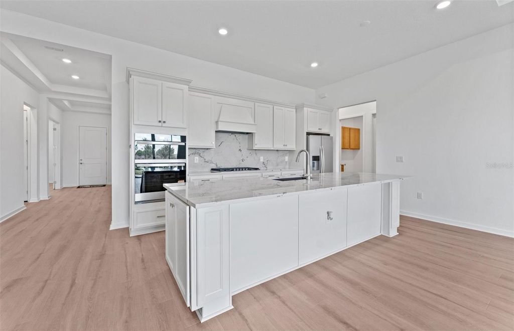 Photo of 6965 Jared Oaks Drive, Wesley Chapel, FL 33545 (MLS # TB8433888)