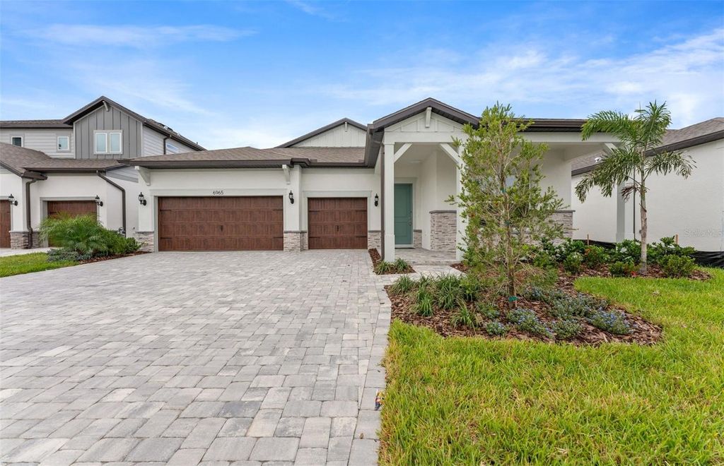 Photo of 6965 Jared Oaks Drive, Wesley Chapel, FL 33545 (MLS # TB8433888)
