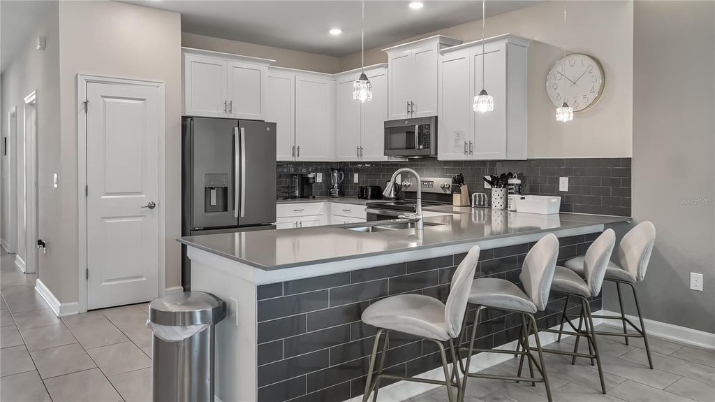 Photo of 1193 Challenge Drive, Davenport, FL 33896 (MLS # O6329381)