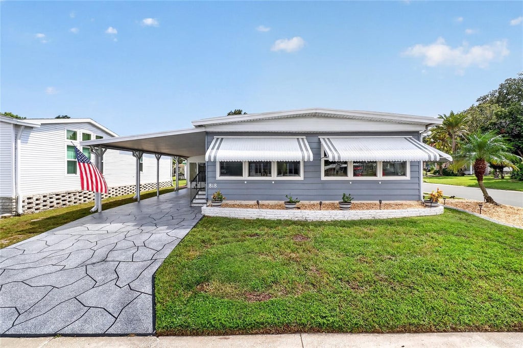 Photo of 818 Forest Lake Drive E, Lakeland, FL 33809 (MLS # L4965291)