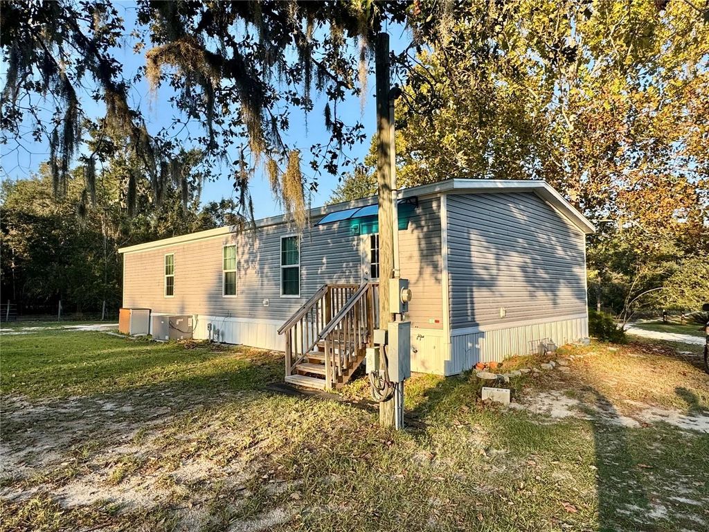 Photo of 2329 NE 80th Avenue, High Springs, FL 32643 (MLS # GC534926)