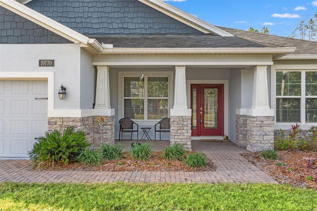 Photo of 19770 Tattnal Way, Brooksville, FL 34601 (MLS # W7879299)