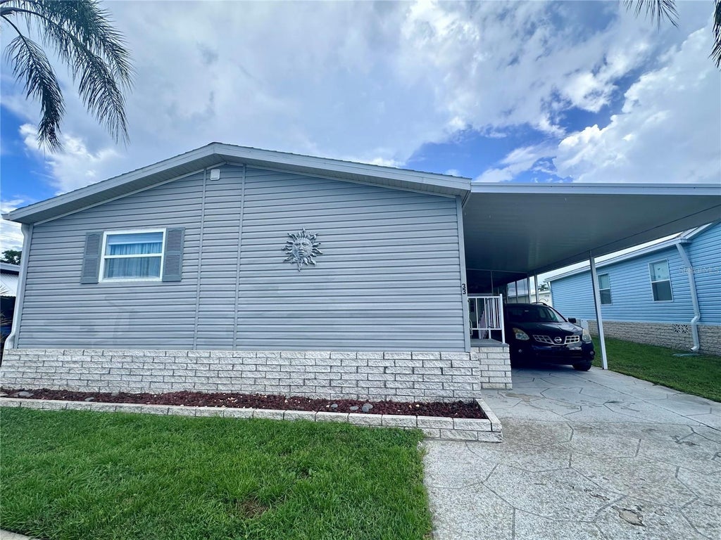 Photo of 1100 Belcher Road S #33, Largo, FL 33771 (MLS # TB8548567)