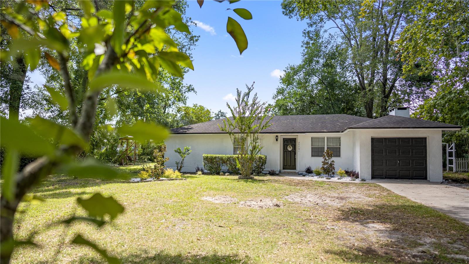Turn-Key Investment Opportunity in Country Way, Newberry! Welcome to this beautifully renovated concrete block home in one of Newberry’s most desirable neighborhoods. Fully furnished and set up for short-term rental, this property is being sold turn-key—ready for income or your own personal retreat. Even better, there are several bookings already secured, with terms negotiable to the buyer. Inside, you’ll find brand new luxury vinyl plank flooring, a brand-new HVAC system, and a custom kitchen featuring new cabinetry, stylish butcher block countertops, and modern updates throughout. The bathrooms have been refreshed, and the garage has been converted into a heated & cooled Gator-themed game room that doubles as flexible living space. Step outside to enjoy a screened-in back porch overlooking a private, tree-lined backyard—perfect for entertaining. Sitting on a spacious third of an acre, the property feels secluded yet is just minutes from everything Newberry has to offer. This home offers the best of both worlds: a solid, well-built property with modern updates and an immediate income-producing setup. Every detail is handled for you on this one, so don’t miss your chance to own this stylish, move-in ready home with endless potential!