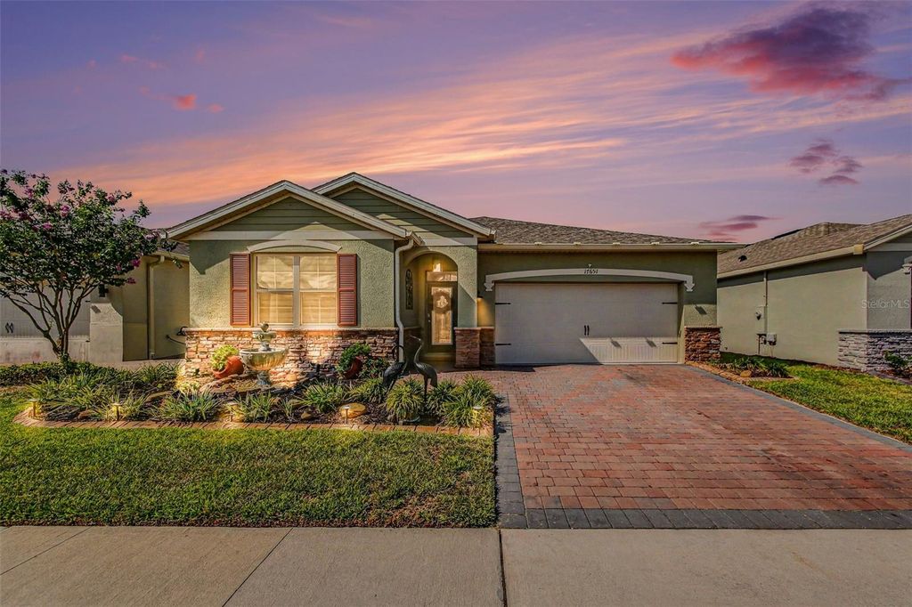 Photo of 17651 Blazing Star Circle, Clermont, FL 34714 (MLS # TB8511464)