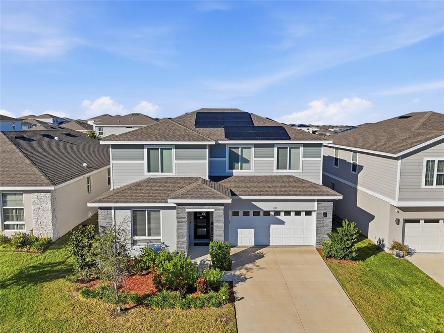 Welcome to this spacious 5-bedroom, 3-bath home located at 1123 Sugarwood Drive in Davenport. Designed for comfort and flexibility, this property features a bright, open layout, generous living and dining spaces, and a modern kitchen with stainless steel appliances, ample counter space, and a large island.

The home includes a full in-law suite on the first floor, offering its own bedroom, bathroom, and living area—perfect for extended family or guests. Upstairs, the primary suite features a large walk-in closet and private bath, along with three additional well-sized bedrooms. The upstairs loft creates a versatile space for an office, media room, or flex area.

This home is equipped with solar panels, providing energy efficiency and lower monthly electric costs. A beautiful screened-in backyard offers outdoor space for relaxation, and a two-car garage adds convenience.

Well-qualified applicants must provide proof of employment, maintain a good credit score, and have a minimum income of at least three times the monthly rent. 

Located close to shopping, dining, schools, major highways, and Central Florida attractions, this home delivers comfort, practicality, and an excellent location.