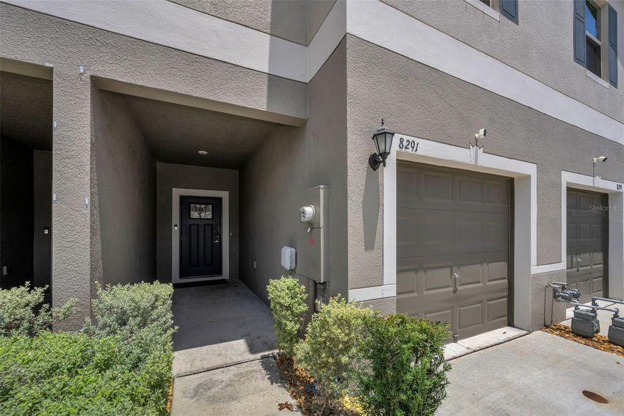 Beautiful NEARLY NEW (Built in 2023)  three bedroom, two full bath/one half bath TOWNHOME in the Bryant Square community located in the Trinity Corridor of Tampa Bay. (The Trinity Corridor is a rapidly growing upscale residential and commercial hub on the north Tampa Bay border.) This lovely residence, with NO CARPET, has a one-car oversized attached garage, covered lanai and an airy expansive main level open-concept design. Large kitchen has spacious dining area, wood cabinets, granite countertops, breakfast bar seating for four, stainless appliances (gas stove and gas dryer) and tile flooring. Convenient half bath located on the first floor. Entire second floor has NEW LUXURY VINYL PLANK FLOORING, big bedrooms and closets, a walk-in closet and ensuite bath in primary bedroom and a second floor laundry room. Loft on second floor offers flex space for home office area, play space, etc.  Tankless water heater. Hurricane shutters for entire home! Tons of storage space! Low HOA fee covers exterior maintenance, pools, cabanas, guest parking and green spaces. NO FLOOD ZONE! Top rated school district. Located just minutes from premier shopping and dining (Mitchell Plaza), healthcare facilities, Tampa International airport and some of Florida’s top-rated beaches. This charming townhome offers great value in one of Trinity’s most desirable communities!