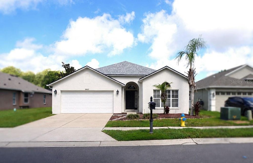 Photo of 18425 Cypress Bay Parkway, Land O Lakes, FL 34638 (MLS # TB8544337)