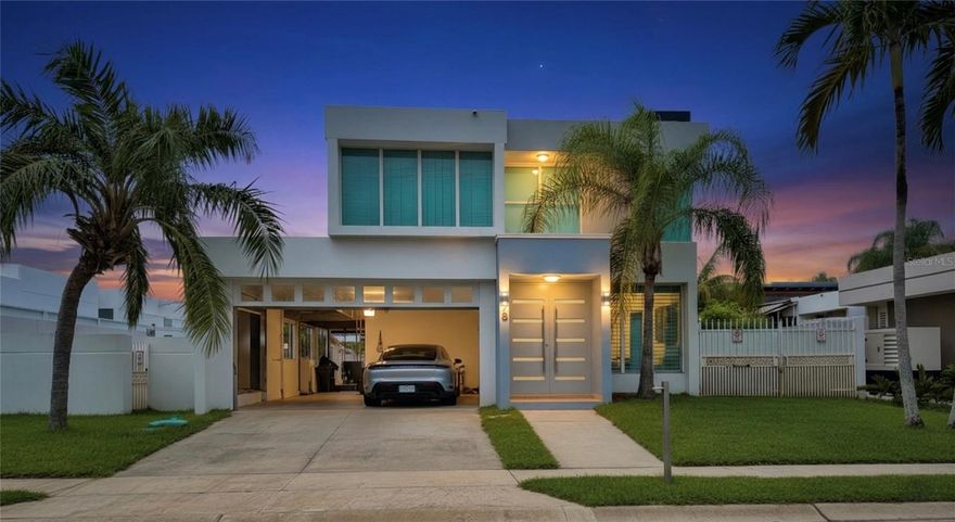 One or more photo(s) has been virtually staged. 21kw GENERATOR + FULLY PAID SOLAR SYSTEM INCLUDED. Nestled within the exclusive Los Paseos community in Dorado, this elegant residence offers the perfect blend of comfort, security, and modern energy independence. Recently upgraded 21kW power generator, a fully paid solar system featuring 22 high-efficiency panels, and two Tesla Powerwall batteries, a 600-gallon water reservoir system,  this home ensures uninterrupted power and sustainable living. Enjoy the prestige of one of Dorado’s most sought-after neighborhoods—just minutes from world-class beaches, shopping, dining, and top private schools—while relishing a serene, family-friendly environment. Experience the best of Dorado living with luxury, convenience, and peace of mind built into every detail.