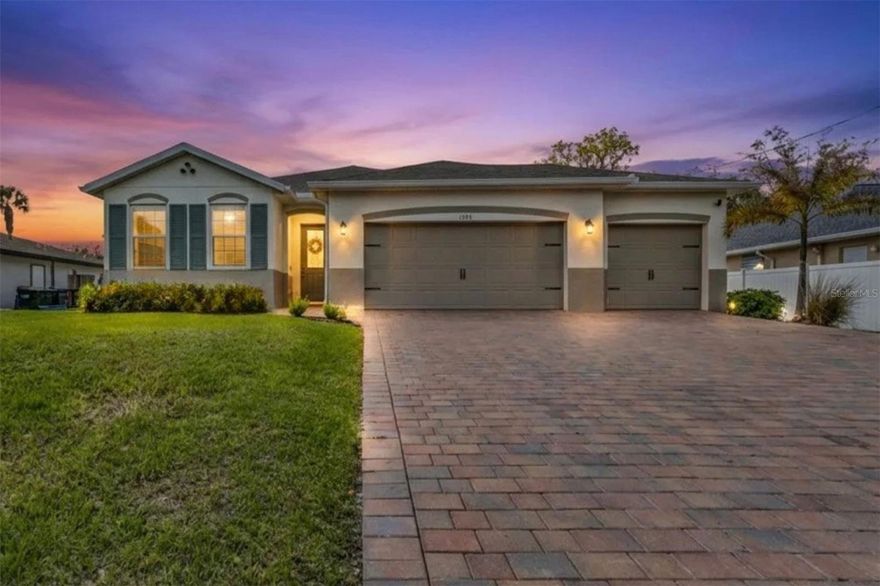 RARE FIND! 2024 BUILT HOME WITH 3-CAR GARAGE AND CITY WATER! This spacious 4-bedroom, 2-bath home in North Port offers a modern open-concept floor plan designed for comfortable living and easy entertaining. The kitchen, great room, and dining area flow seamlessly together, while sliding glass doors and multiple windows fill the space with natural Florida sunshine. The kitchen island sits at the center of the home, making it perfect for entertaining. Features include quartz countertops, stainless steel appliances, abundant cabinetry, under cabinet lighting, and a walk-in pantry. The private primary suite, located at the back of the home, comfortably accommodates a king-size bedroom set and includes two walk-in closets, dual vanities, a walk-in shower, and a private water closet. At the front of the home, two guest bedrooms share a full bathroom, while a flex room with a closet offers the option of a home office, den, or fourth bedroom. Step outside to the covered and paved lanai, ideal for relaxing or entertaining, overlooking the fully FENCED backyard that provides privacy and space for pets or play.
Additional features include smart door/Deako lighting, hurricane shutters, and IRRIGATION - this home checks all the boxes! Conveniently located near shopping, dining, parks, schools, and easy access to I-75, making commuting throughout Southwest Florida simple.