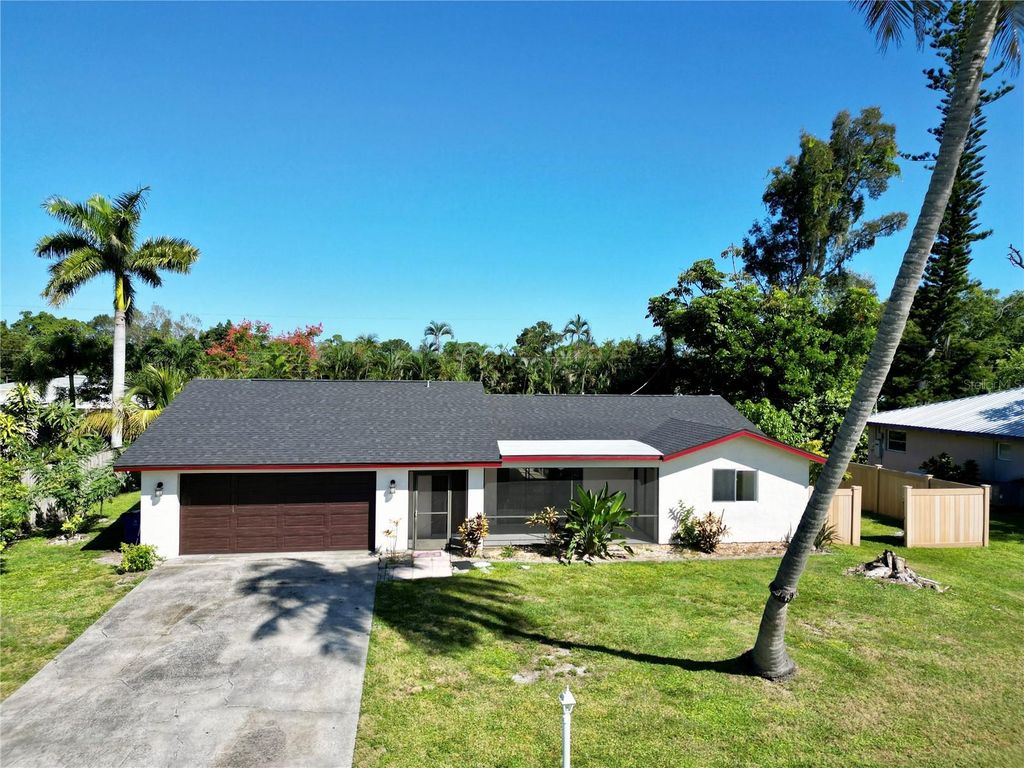 Photo of 2461 Woodland Circle, Fort Myers, FL 33907 (MLS # A4669026)