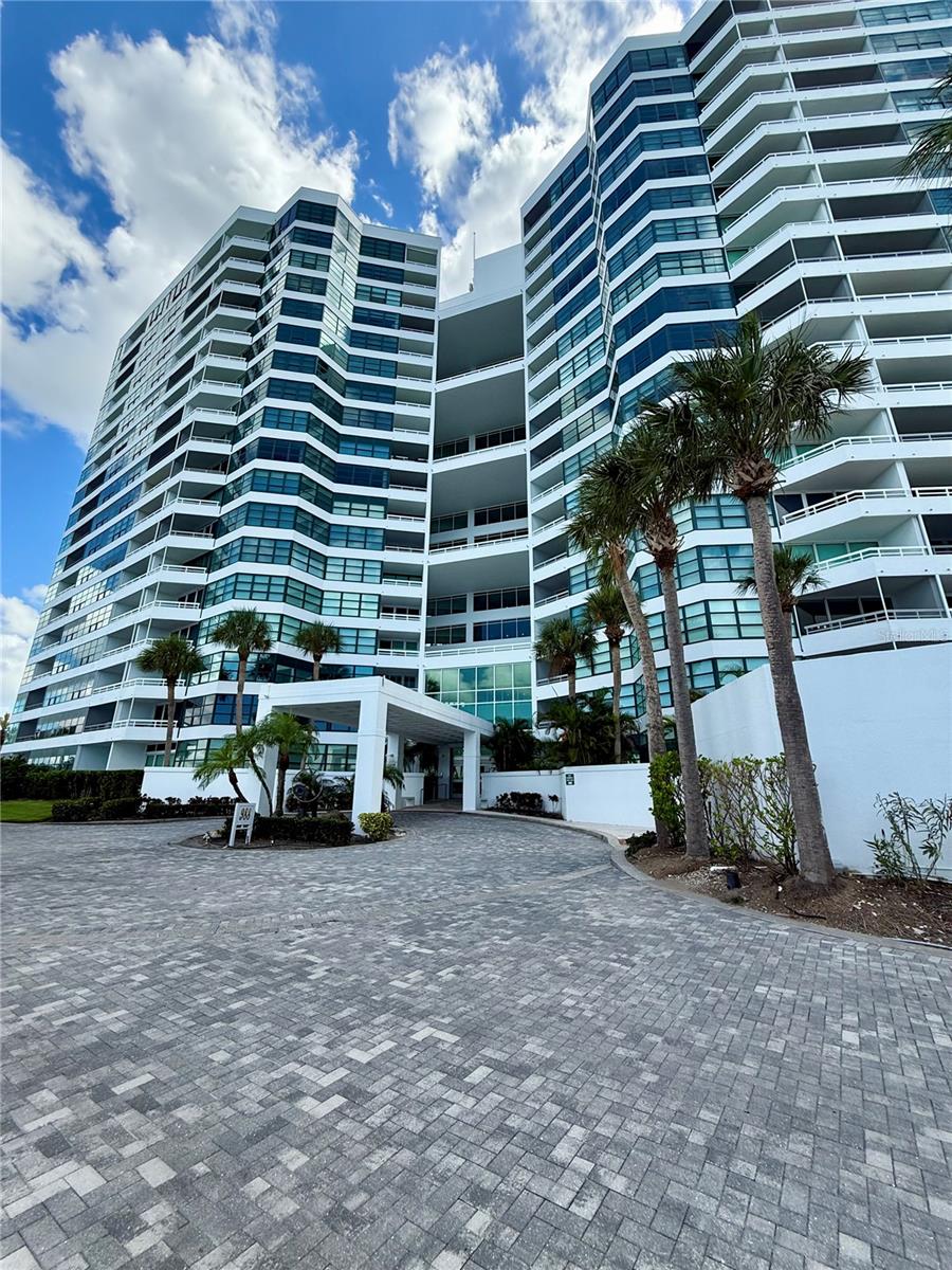 One or more photo(s) has been virtually staged. LOCATION, LOCATION, LOCATION. UNFURNISHED ANNUAL RENTAL CONDO AVAILABLE AT THE SOUGHT AFTER CONDO ON THE BAY COMMUNITY. This is a rare opportunity to live at one of the best condo buildings in Sarasota. The end unit condo boasts two bedrooms plus a den/office with a murphy bed so can be used as a third bedroom, two and a half bathrooms and has views from every single window. The condo has an open floor plan with split bedrooms, two lanais, gorgeous large kitchen and upgrades a plenty. Upon stepping into the unit the first thing you notice is the views. You can see the Sarasota Bay, Gulf, Lido Key, Longboat Key and from the second bedroom there are city view. ALL THE VIEWS IN THIS UNIT! There is a living room, bonus room, dining room, kitchen combination. The huge kitchen has granite counter tops, stainless high end appliances, double sinks, center island, wine fridge and plenty of room for cooking and entertaining. The primary bedroom has a large built in walk in closet as well as two other closets, views from the large windows and a custom en suite bathroom with double sinks and a stall shower. The guest bedroom has a walk in closet and the third bedroom/den/office has built in book shelves and a murphy bed. The condo has carpet in two of the bedrooms, engineered hardwood and coral stone floors in the kitchen. The condo has a tankless water heater and water purification system. The Condo on the Bay community offers gated security, concierge service, community pool, tennis courts and meeting room with kitchen, fitness center. You're at the heart of it all in this building as you're minutes from downtown Sarasota, Shelby Gardens, The Bay Front, theaters, restaurants and beaches. The condo comes with one assigned garage parking space. Tenant must provide proof of renter's insurance with liability. The Condo on the Bay requires a refundable $200 move in fee and a refundable $200 move out fee. CALL TODAY AS THIS WILL NOT LAST LONG!