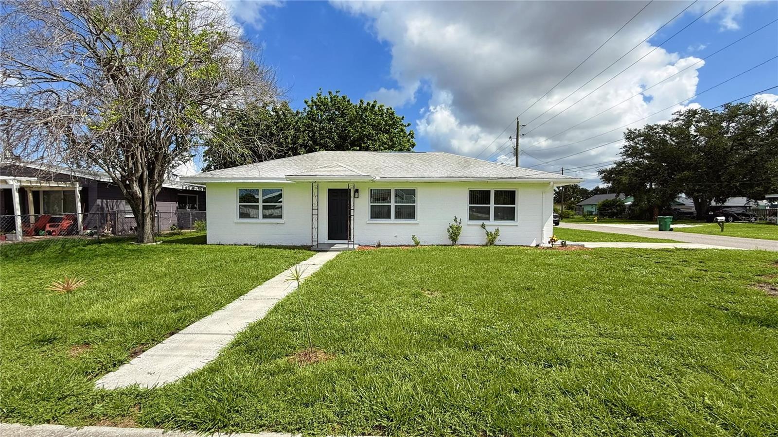 Year 'round Florida living in Palmetto Florida. This cute, 2-bedroom 1 bath home is updated with a NEW Kitchen and Bath. Features include hard surface counter tops, new cabinets, lighting and fixtures. NEW LVP flooring and freshly painted interior in neutral tones. Exterior has been freshly painted also. The large, screened lanai extends the living space of this home. Located closed to US-41, shopping, many restaurants and the Gulf. Make this your new home this summer.