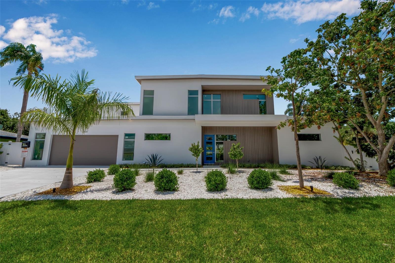Welcome to 2534 Grove Street, a stunning new construction home in one of Sarasota's most coveted neighborhoods. Designed for both comfort and livability, this residence offers generous entertaining spaces on both levels and a seamless flow between indoors and outdoors.
The open-concept main level is perfect for gatherings, with a spacious living area, gourmet kitchen, and dining that opens to a covered lanai, ideal for year-round Florida living. As well as a large downstairs primary suite. Upstairs, you'll find an additional lounge area and well-appointed bedrooms, providing private retreats for family and guests. Outside, enjoy a thoughtfully designed, low maintenance backyard for relaxation or entertaining. Perfectly positioned in the sought-after Southside School district, you're just minutes from the vibrant shops and dining of Downtown Sarasota, and a short drive to the beaches of Siesta Key and Lido Key. Brand new, move-in ready, and built for the way you live, this is Sarasota living at its best.