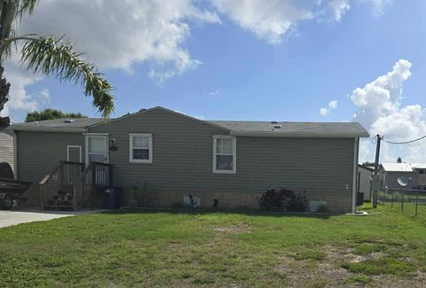 Photo of 1081 6th Street, Okeechobee, FL 34974 (MLS # OK225240)