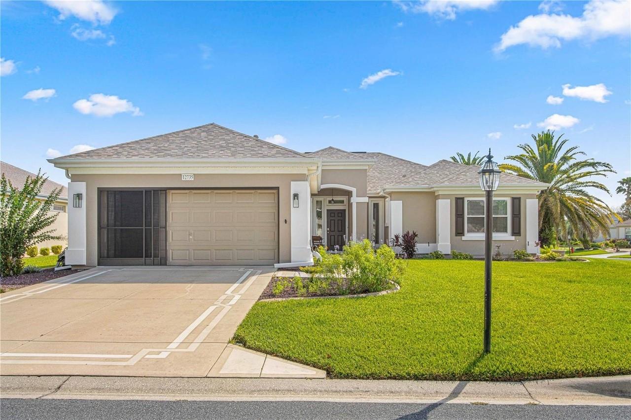 Beautiful completely updated home in Del Webb Spruce Creek Golf and Country Club. 2 Bedroom 2 Bath, New Laminate Flooring, New Cabinets, New Vanities , New Granite Countertops, Enclosed Lanai, New Patio with Pergola Sitting Area. All Utilities, HOA Fees, Internet included. Home is available from May 1st - November 1st. Spruce Creek Golf and Country Club has almost 100 Clubs and Activities for your fun and enjoyment. 36 Championship Holes of Golf, Gym, Pickleball, Tennis, Softball Leagues and much more.