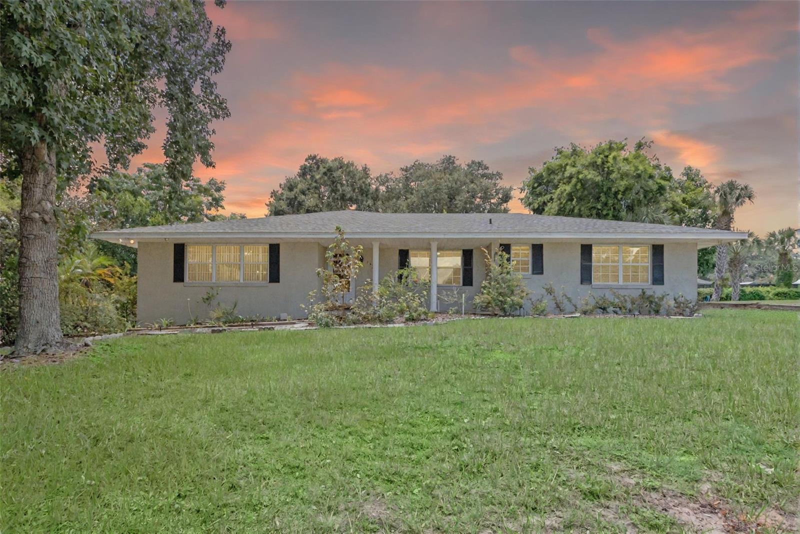 Looking for No Hoa and on an oversized lot in the heart of downtown Clermont. This 3 bedroom, 2 1/2 bath home is situated on over a 1/3 acre and has a nice open floor plan with plenty of space and is in excellent condition. The home has a new roof in 2024 and the HVAC was replaced in 2023. There is no carpet in this home and everything has been well maintained. Excellent location to everything. The home features large spacious rooms perfect for entertaining and there is a large covered and screened in porch with a large backyard with room for a pool. There are also two sheds that are on the property and a large driveway perfect for all of your friends and family to park. Don't let this little gem of a home pass you by. Ask about our financing incentives when using our preferred lender.