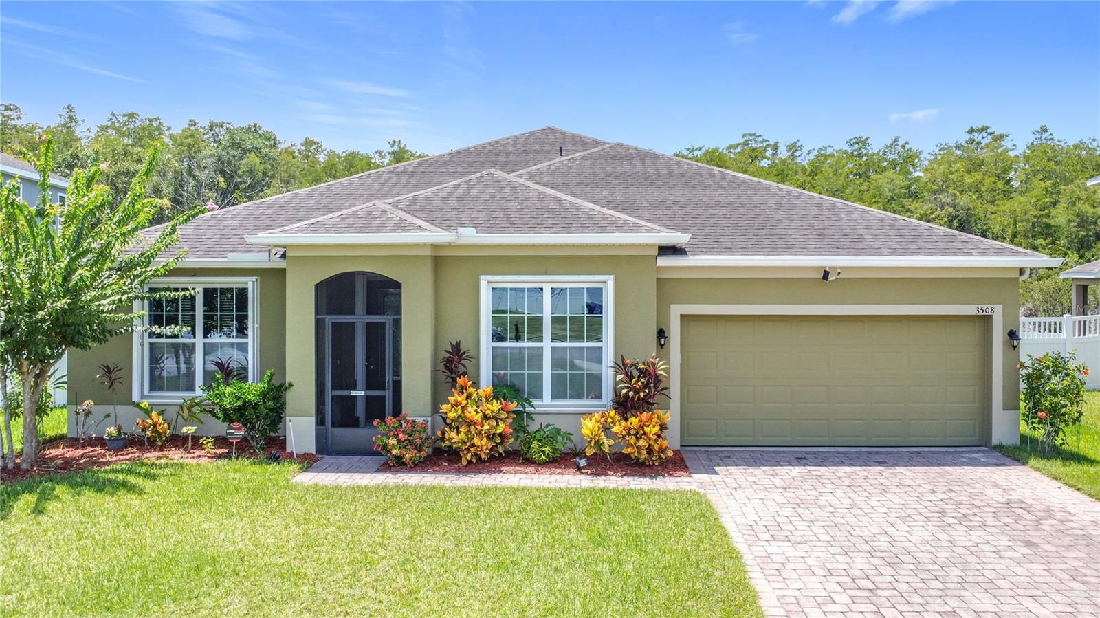 Your dream Florida home is here, 5 bedrooms, gorgeous upgrades, and a massive screened patio with stunning conservation views. Located on a quiet street with a large private lot, this home blends comfort, style, and convenience in one perfect package. This immaculate five-bedroom, two-and-a-half-bath home is your perfect piece of Florida sunshine, tucked away on a quiet street with a large lot backing to a wooded conservation area for ultimate privacy. Enjoy the magnificent 43' x 26' screened patio with serene nature views, perfect for relaxing, entertaining, or dining outdoors. The backyard also features a paver patio, ideal for a fire pit, BBQ with friends, or simply soaking in the peaceful setting.
Inside, the inviting foyer opens to a spacious living and dining area, leading to the heart of the home, a large, open kitchen with a huge center island, stunning granite counters, custom backsplash, tall cabinets, and stainless steel appliances. The kitchen flows seamlessly into the family room, making it perfect for hosting gatherings.
The split floor plan offers a private, oversized master suite with a spa-like bath, while the secondary bedrooms are set apart for privacy. One front bedroom is currently used as an office, ideal for guests or remote work.
Low HOA fees and a prime location just 3 miles from the Florida Turnpike mean easy access to theme parks, Downtown Orlando, shopping, dining, and more. Grocery stores, restaurants, and bus routes are close-by.
This home truly shines—be sure to check out the virtual tour! Motivated sellers, schedule your showing today!