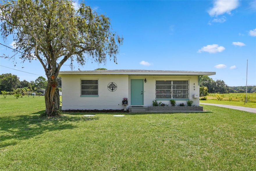...Ever dream of living in the country but only 12 miles to the beach and Flagler Avenue!? This 2-bedroom 1 bathroom cottage has a brand-new roof, complete in July 2022. All new paint on the exterior, back deck has been stained and all new landscaping in the front of the home. Lots of exterior upgrades. In 2017 a new 34x23 metal building was installed, as well as a 12x10 storage shed. A Generac generator powers the cottage in case of a power outage. The property is just under 5 acres and is zoned agricultural for a nice tax break. Horses are welcome. No HOA payments either. Sit on the cozy back deck after the sun goes down and enjoy a long range beautiful view of the moon and stars. Plenty of room to start that garden full of veggies or that wildflower garden you have always wanted. Maybe get a few farm animals...maybe a horse even? Plenty of room on this nicely cleared 5 acres. And, if you need space for RV or boats?! Room for every toy you own. Super quiet farm area, with 2 feed stores super close for all your animals needs. All information and measurements are intended to be accurate but not guaranteed.