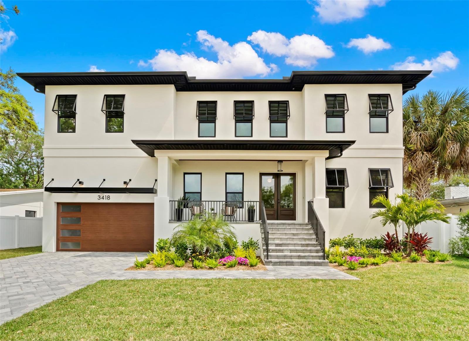 Move in ready! New luxurious and elegant modern transitional residence is located in the heart of South Tampa’s beautiful Bel Mar Shores. Designed with livability in mind, this stunning home has 5 bedrooms, 6 baths, and a bonus room. 4217 sq ft. Featuring many amazing luxury finishes throughout. Beautiful wood work and crown moldings along with wide plank engineered wood flooring throughout and 8’ tall solid wood doors illustrate incredible attention to quality and detail.
Double door entry and impressive foyer welcome you to this fabulous open floor plan home. You will enjoy the extraordinary gourmet chef's kitchen with stainless steel appliances, custom cabinets with loads of space, an oversized island, quartz countertops, under cabinet lighting, large eat in breakfast space, a walk in pantry with custom wood shelving and separate butler's pantry with wine fridge.
The expansive great room opens up to your private retreat featuring a resort like screened pool/spa and outdoor kitchen area great for entertaining. If outdoor living is your way of life, then this home will not disappoint. This amazing backyard oasis features an expansive covered lanai with Vinyl fencing, and abundant lounging, sunning and green playing areas where the entire family can rest, rejuvenate, play and come together.
This exceptional home’s main floor also boasts an open concept with a spacious Great room, formal dining room, an office/guest suite, wine cooler and a mudroom. Upstairs you will find the owner’s retreat, with 2 enormous walk-in custom designed wood closets and a spa inspired bathroom with floor to ceiling tile, an oversized walk-through shower and a free standing tub. 3 more bedrooms each with private ensuite bathrooms and custom walk in closets, a large bonus loft and a generous laundry room complete this level’s floorpan.
Full security system. Electronics closet allowing for hidden wireless entertainment system. Pre-wired for surround sound. Soft close cabinet doors and drawers. Tropical landscaping and new fencing to enjoy the expansive back yard for entertaining. Energy efficient Low-E impact glass windows. 10 yr structural warranty
Designed to surpass your expectations of quality, styling and craftsmanship.