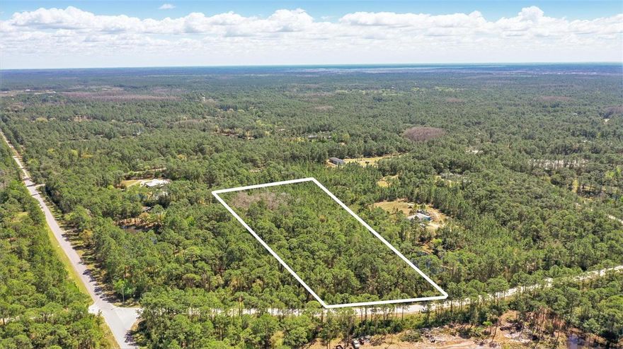 Build your dream home on 5.09 acres of prime, buildable land in the gated Lake Harney Woods. Ideally situated for easy access to Titusville, Oviedo, and Orlando, this property offers the best of both worlds: a peaceful, wildlife-rich environment with a private boat ramp to Lake Harney and the St. Johns River, and the convenience of nearby urban centers.