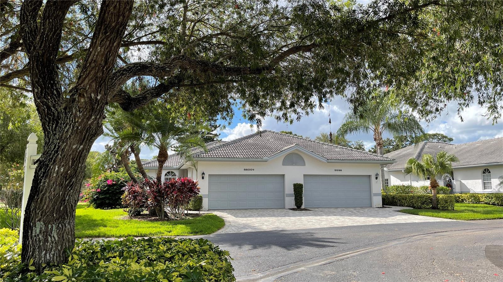 Turnkey Furnished Rental Available for Off Season June 15th - November 30th. Maintenance-free Villa located in Long Common on the 11th fairway with amazing golf and water views. Your paver brick driveway leads to a quaint gated courtyard. Enter through the spacious hallway featuring high 10 feet volume ceilings with crown moldings. The Master Suite boasts a walk-in closet, en-suite bath, golf course and lake views. The two-car garage offers plenty of storage space for your car and toys. The Long Common location is superb, close to the community pool & the three golf courses at the Meadows Country Club. Only a short distance to Lakewood Main Street shopping, restaurants, and cinema. Convenient to the UTC Mall, shopping, restaurants, entertainment, and Lakewood Ranch Hospital. Easy access to I-75, Sarasota Airport, Tampa International Airport, and Tampa/St. Petersburg. Only Minutes from Nathan Benderson Park with world class rowing events, premier sports fields and world class beaches.
