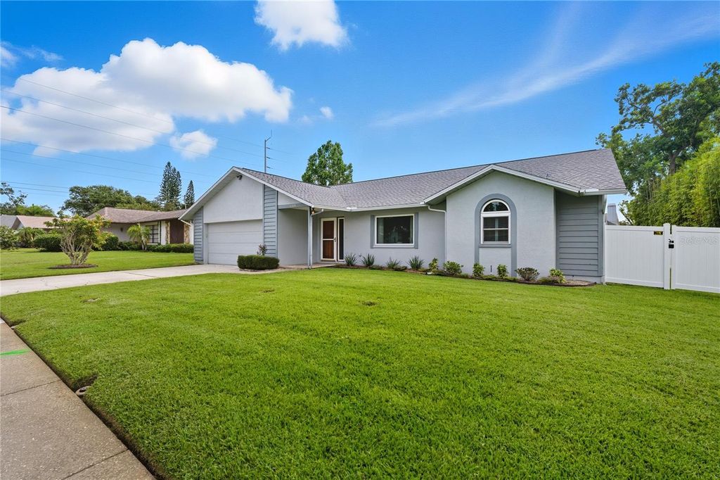 Photo of 1569 Burnham Lane, Dunedin, FL 34698 (MLS # TB8433835)