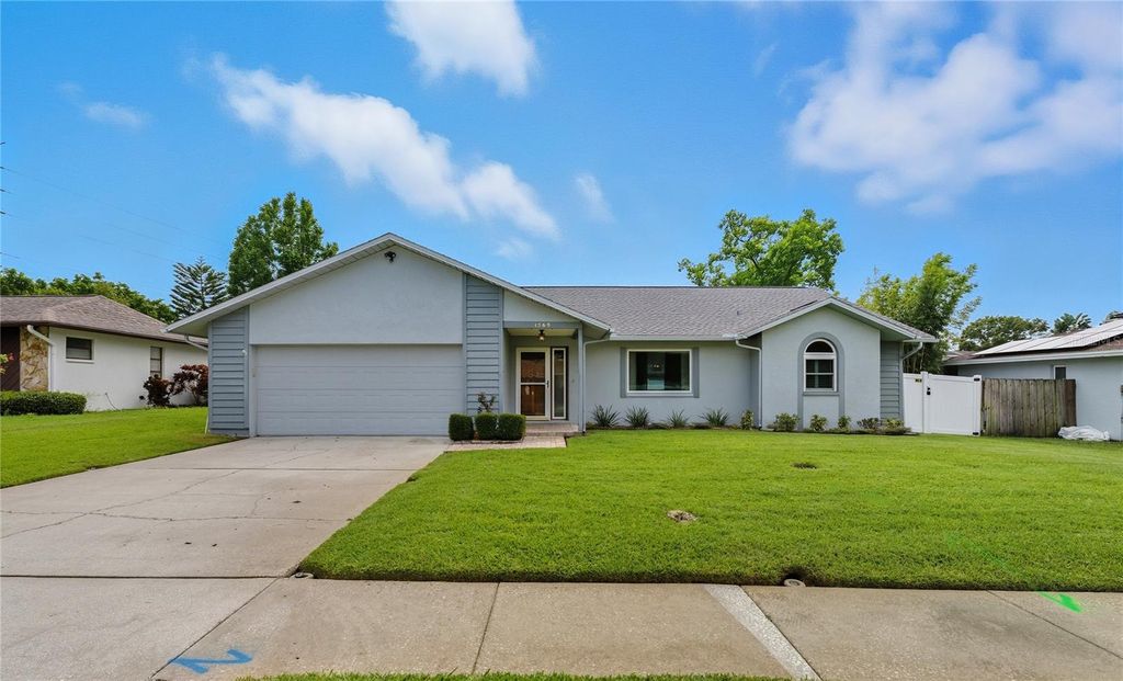 Photo of 1569 Burnham Lane, Dunedin, FL 34698 (MLS # TB8433835)