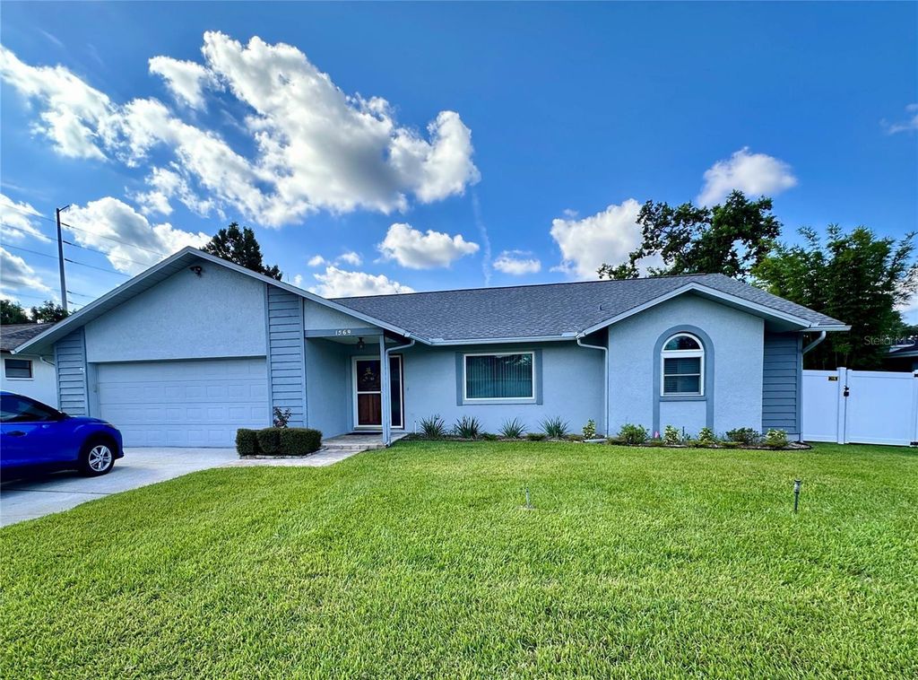 Photo of 1569 Burnham Lane, Dunedin, FL 34698 (MLS # TB8433835)